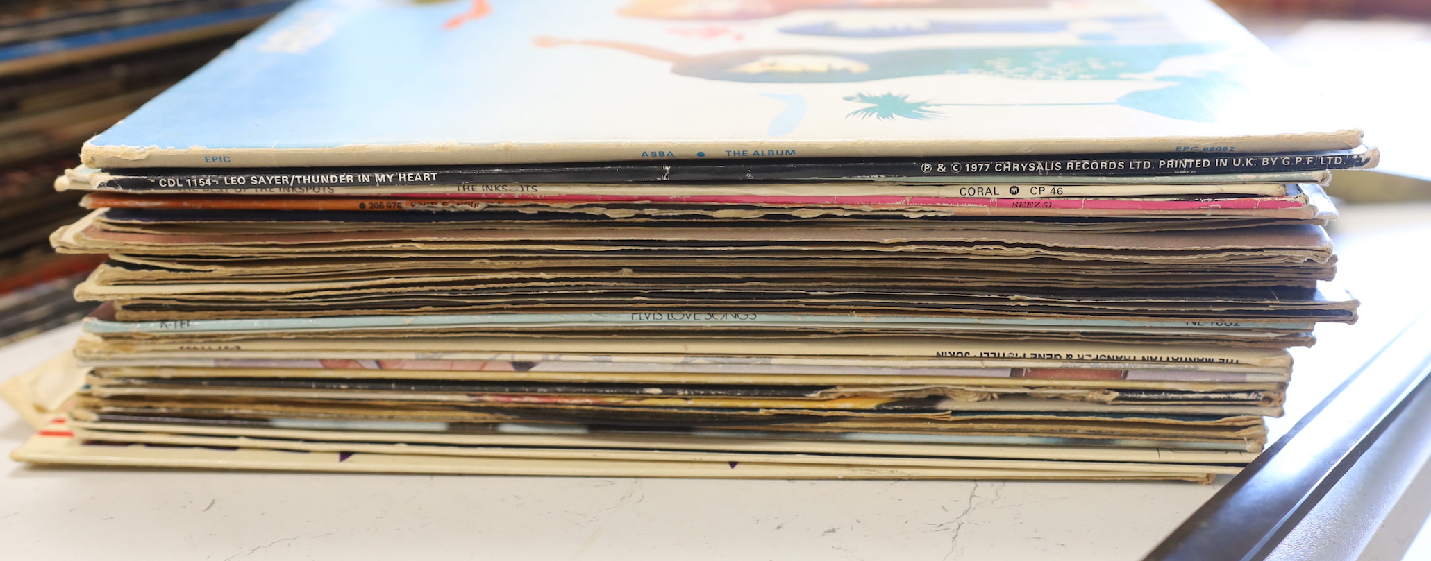 A quantity of various records, to include ABBA, Genesis, etc.